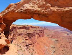 Looking through an arch into the Canyonlands