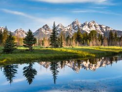 Grand Tetons National Park and river reflection