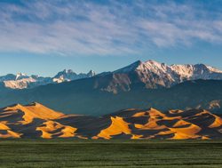 Great Sand Dunes National Park with mountain background