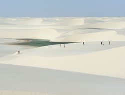 20220717124205 Travelers exploring the dunes of Lencois Maranhenses National Park