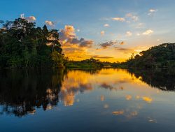 Manu National Park amazon river sunset on the river