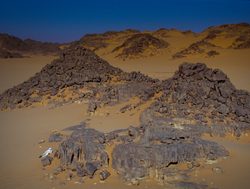 Tassili n%27Ajjer National Park rock croppings in desert